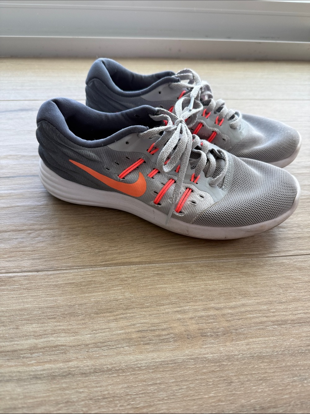 Nike Lunarstelos Womens Gray and Orange Athletic Running Sneakers